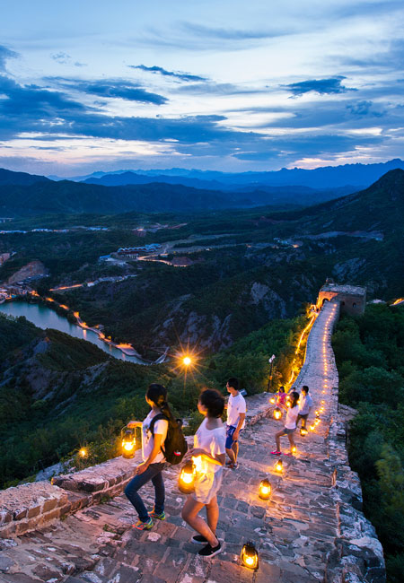 Experience hot springs in a water town at the foot of the Great Wall and have a romantic Great Wall night tour.