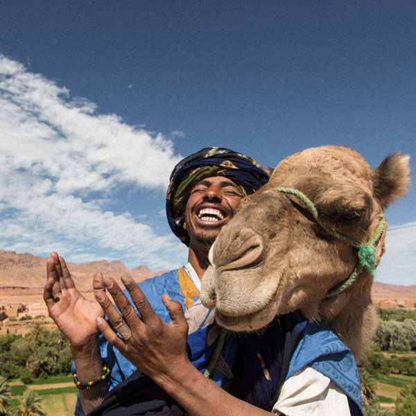 Moroccan camel man at Tinghir Valley